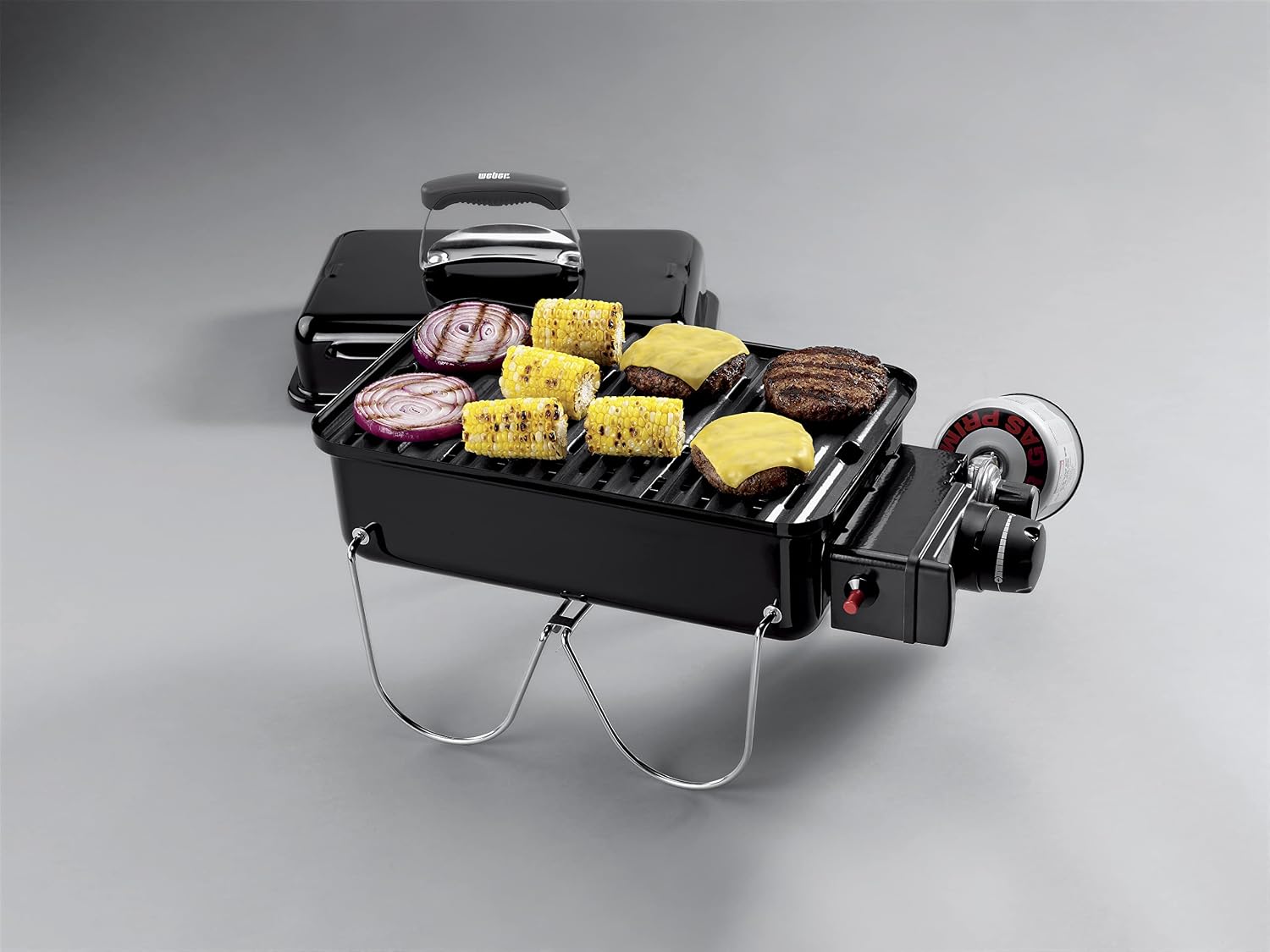 Weber Go-Anywhere Gasgrill | Grill mit klappbaren Beinen, Zündknopf, Robuste Emaille, leicht, kompakter Campinggrill, 42 x 26 cm Grillfläche, Schwarz